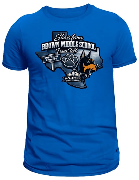 Blue t-shirt with Brown Middle School Doberman graphic and text reading She is from Brown Middle School I can tell